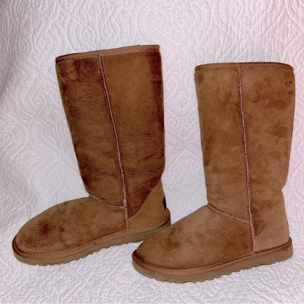 Ugg Australia Classic Tall 5815 size W6.  These are brand new without the box.